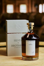 An image of Silver Brothers Rye Whiskey with a gift box.