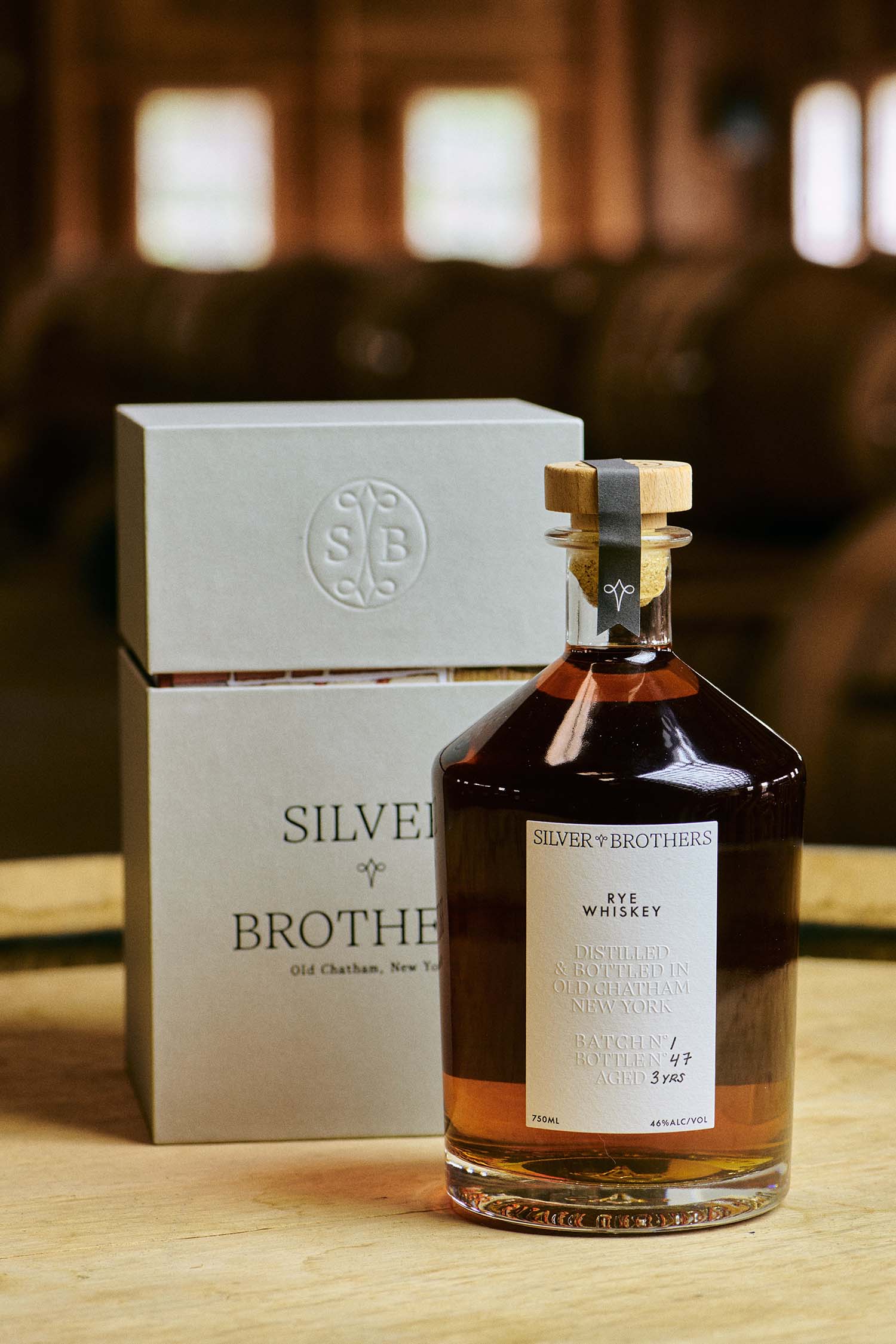 An image of Silver Brothers Rye Whiskey with a gift box.